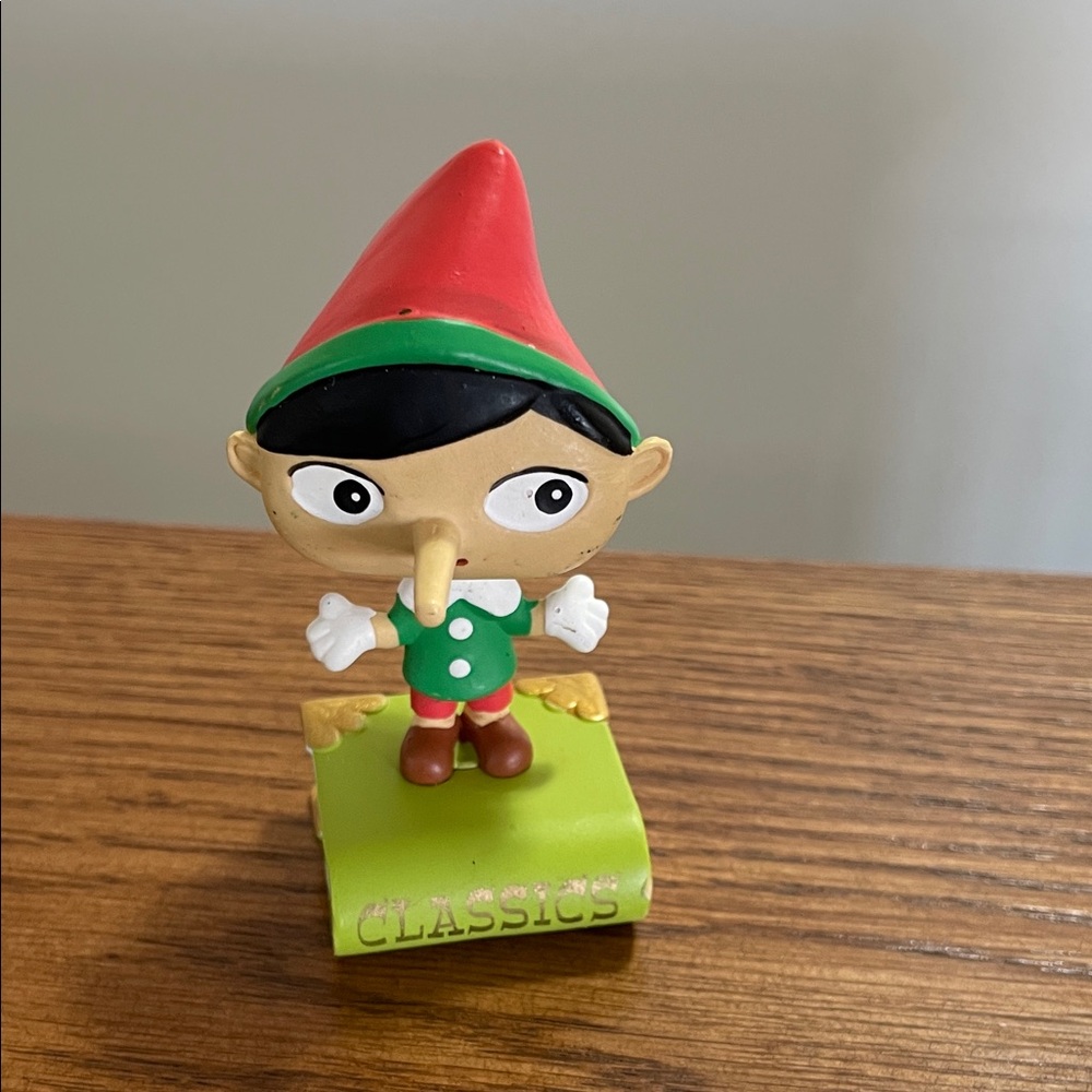 Pinocchio Figurine with Red Hat